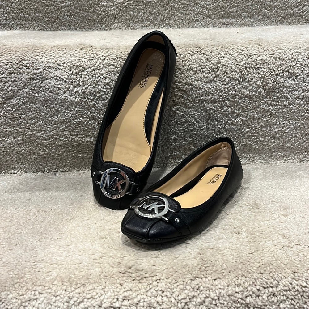 Black Michael Kors shoes.